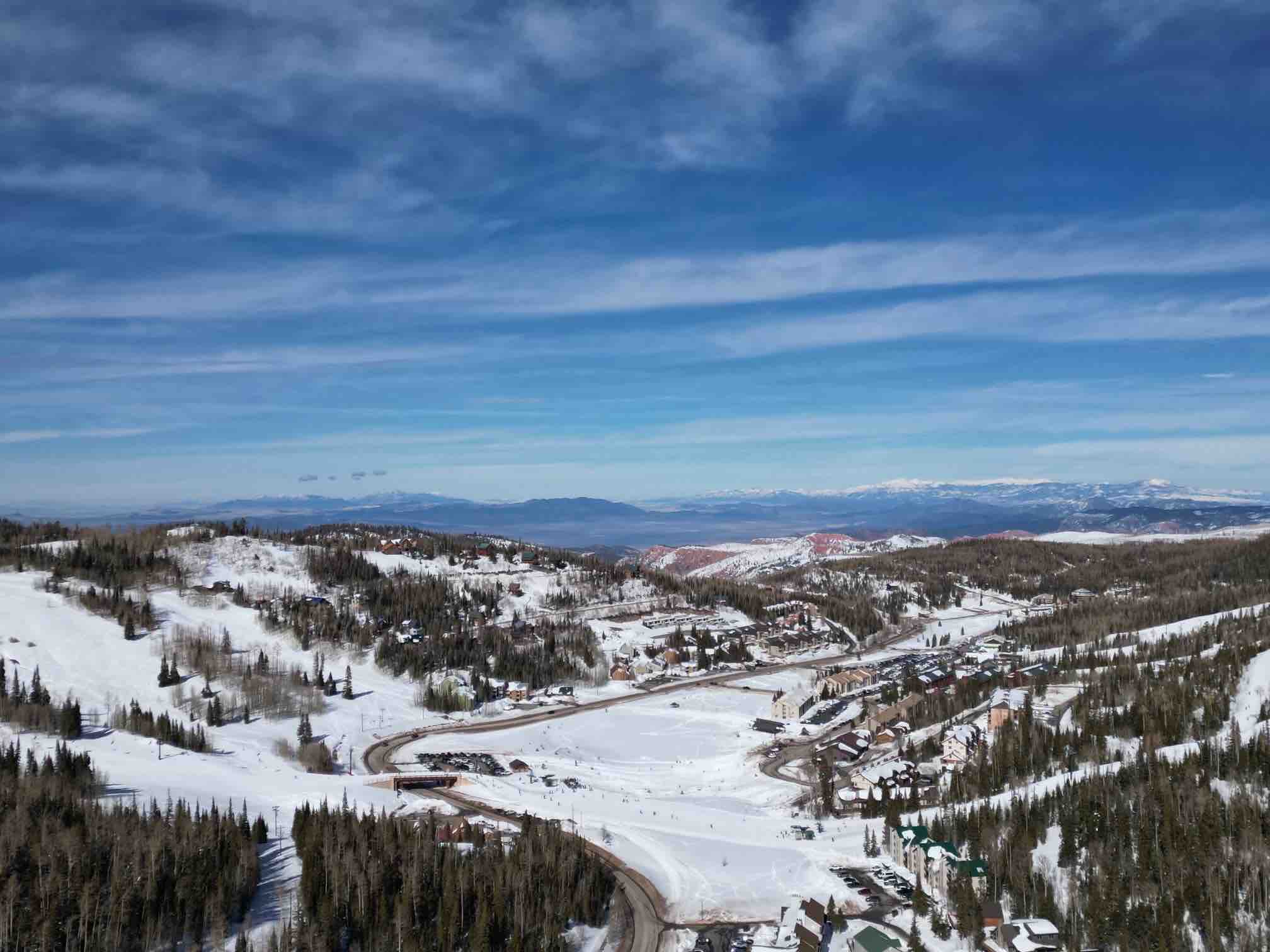 View from above Brian Head with snow and cabins